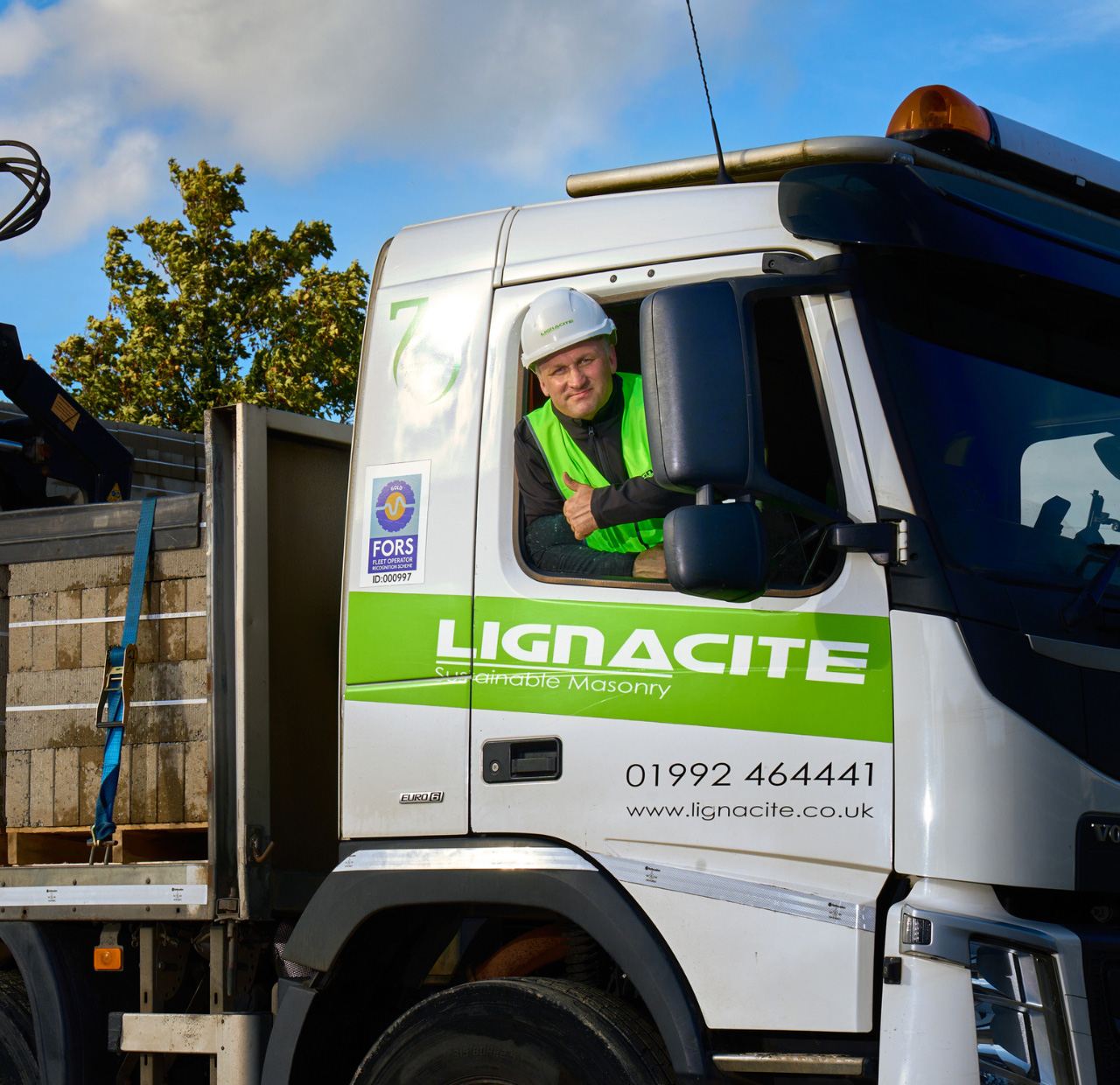 Lignacite driver in delivery lorry